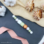 Zahnungswurmi Pastellgrün | Weiss | Bronze