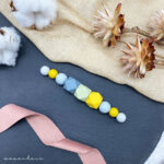 Zahnungswurmi Dunkelgrau | Pastellgrün | Senf