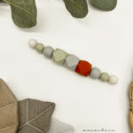 Zahnungswurmi Grün | Grau | Rost